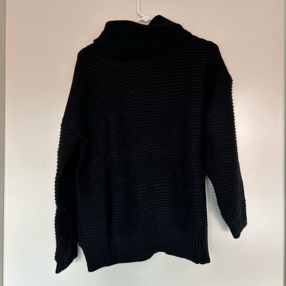 Black turtleneck sweater